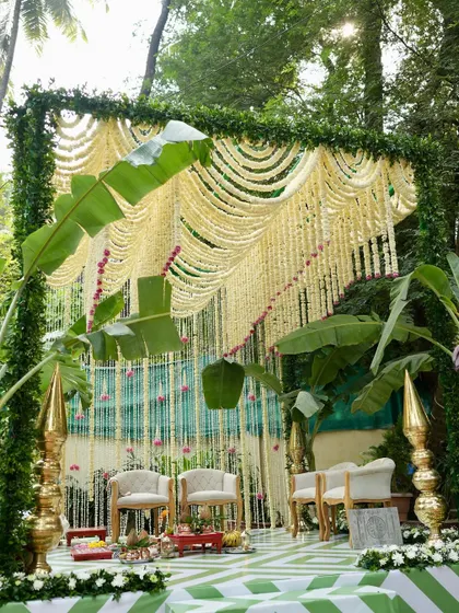 This is what I mean by a dreamy, aesthetic wedding. For this intimate ceremony, I designed a mandap using a canopy of delicate white tuberoses and jasmine, framed by lush banana leaves to create a space that felt both sacred and refreshingly modern.
