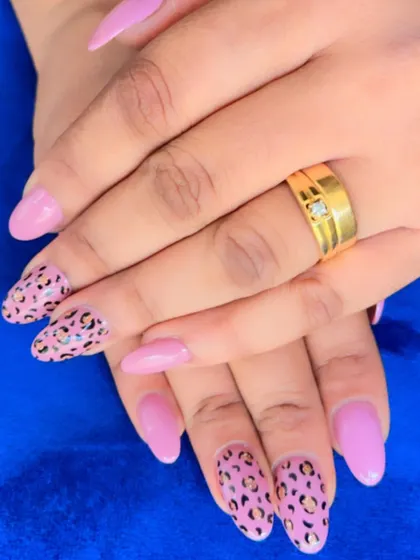 A close-up of our pink leopard print nail art. We added tiny details to the spots to give them a more realistic and dimensional look.