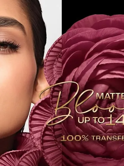 A campaign visual for a Lakmé matte liquid lipstick. The model wears a deep mauve shade, and the ad emphasizes the product's long-wearing and transfer-proof qualities, key selling points for this type of cosmetic.