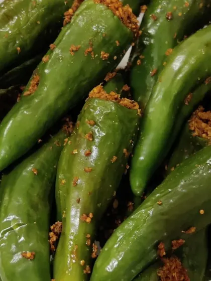 Our Bharwa Hari Mirch, or stuffed green chilli pickle. The masala filling is a family recipe that makes this pickle truly special.