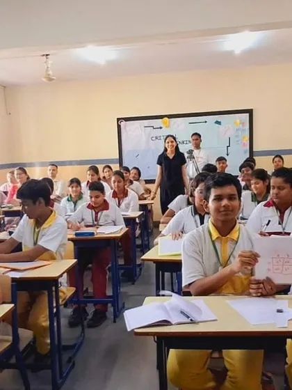 A classroom of high school students at a DPS school engaged in a critical thinking exercise. I facilitate sessions for all age groups, adapting my approach to meet their unique learning needs.
