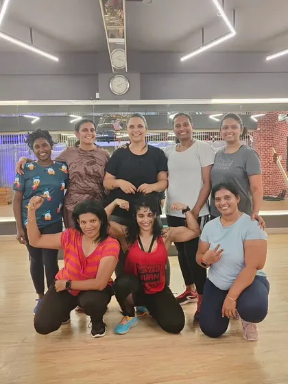 The heart and soul of my classes. Each photo captures a unique moment with my incredible community after a sweaty, joyful session. This is our shared victory lap.