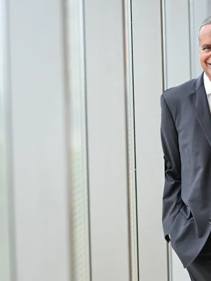 Using the soft, natural light from a large window, this portrait of a senior executive feels open and optimistic. It's a great way to portray a forward-thinking leader.