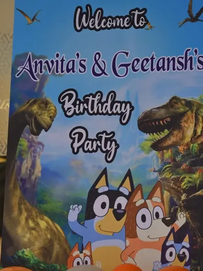 The welcome sign for a combined Bluey and Dinosaur themed birthday party, showcasing the custom design that merges both worlds.