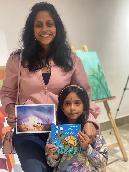 A mother and daughter enjoying a creative session together. Art is a wonderful way to connect and spend quality time, and I love seeing families create side-by-side.