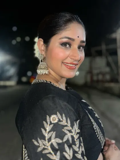 A happy, candid close-up of Donam Bajwa. Her smile says it all; she feels great in her rented festive wear.