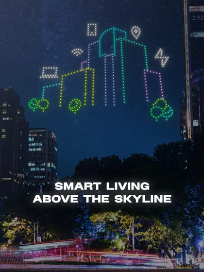 This drone show for a smart living development visualizes a connected home with icons for WiFi, location, and energy. It's an innovative way to communicate key features of a tech-forward project.