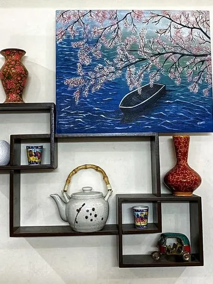 Here is the commissioned cherry blossom painting as wall art in a client's home. It shows how a custom piece can become the focal point of a room's decor.