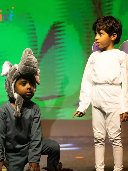 An elephant and a butterfly on stage together, showcasing the wonderful animal kingdom of Bhumi.