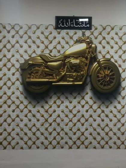 A unique 3D custom wallpaper featuring a golden motorcycle. This is a great example of a personalized mural that reflects the client's passion.