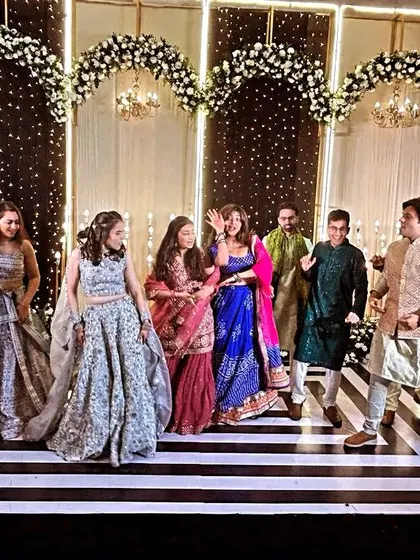 A fun dance-off between the girls and boys. These group performances are a great way to get everyone involved and add some friendly competition to the sangeet.