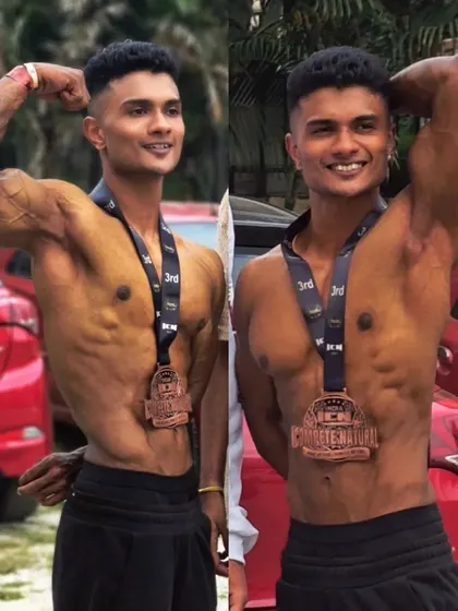A client proudly wearing his 3rd place medal after a competition. Every placing is a victory and a step forward.