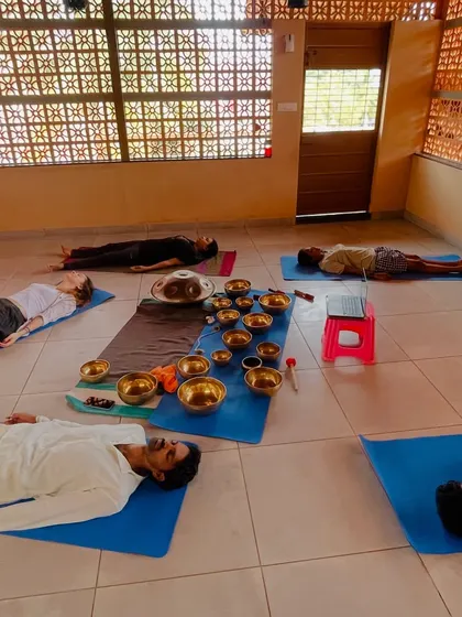 Participants in deep relaxation during a sound bath.