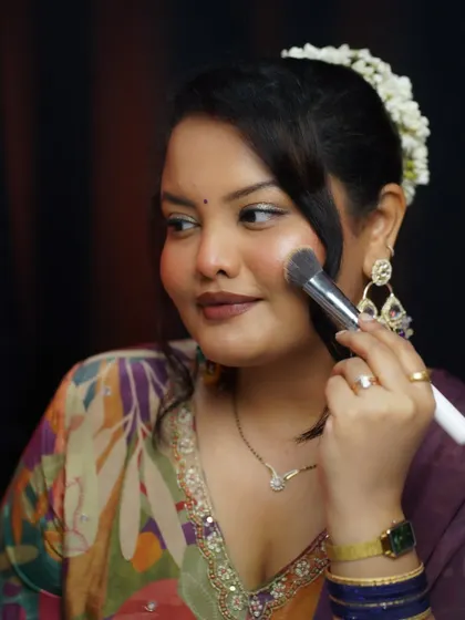 A candid moment of applying blush. I teach the correct placement of blush to lift the face and give a youthful, fresh appearance.