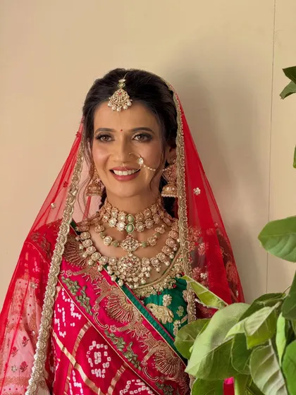 A smiling bride looking directly at the camera, showing how confident and beautiful my clients feel.
