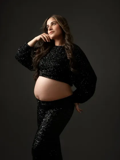 Who says you can't be a disco queen during your pregnancy? This black sequin two piece outfit is perfect for a modern, chic, and glamorous maternity photoshoot.