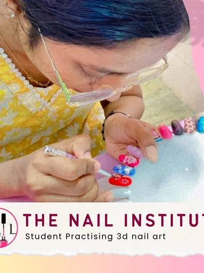 A student practices creating detailed 3D floral nail art, a popular and advanced technique that adds dimension to any manicure.