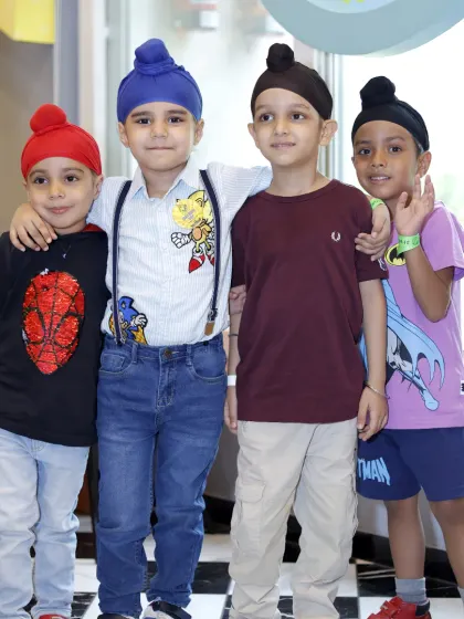 A group of young friends ready for a day of fun. We love seeing kids form bonds and make new friends at our play center.