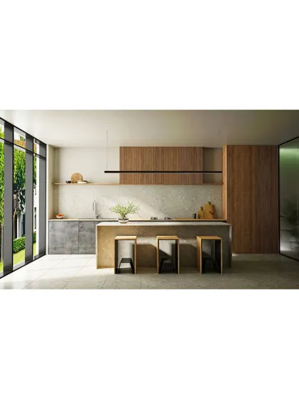 This kitchen design seamlessly integrates with the outdoors through a large glass wall. The minimalist island with bar seating and wood-paneled cabinets creates a natural and open feel.