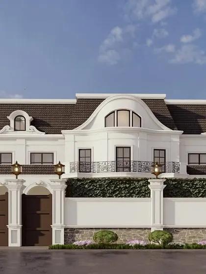 The front elevation of a classical residence, showcasing its symmetrical design and prominent arched window. The formal gate and boundary wall provide a sense of privacy and prestige.