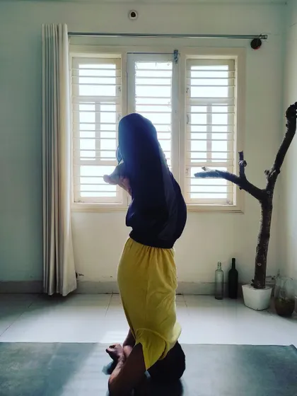 Happy Vijayadashami. A moment of balance and focus in Padmasana Sirshasana (Lotus in Headstand), inspired by our community.