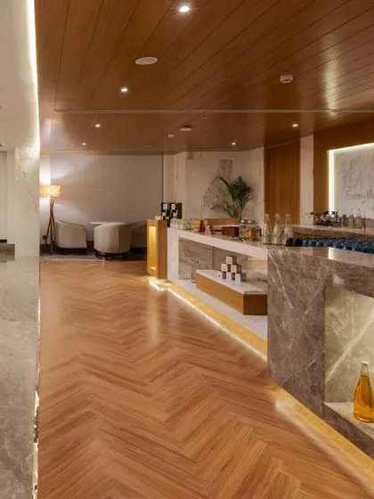 Additional views of the Radisson Resort, Khopoli, showcasing various interior and exterior details, from lobby seating areas and restaurant layouts to guest room configurations and architectural elements.