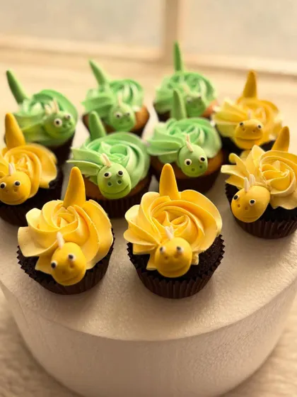 These cute yellow and green dinosaur cupcakes were part of a larger dessert table. The simple yet adorable design is always a favorite among kids.