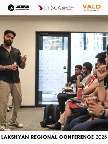 A presenter engages with the audience during a session at the Lakshyan Regional Conference 2025, fostering an interactive learning environment.