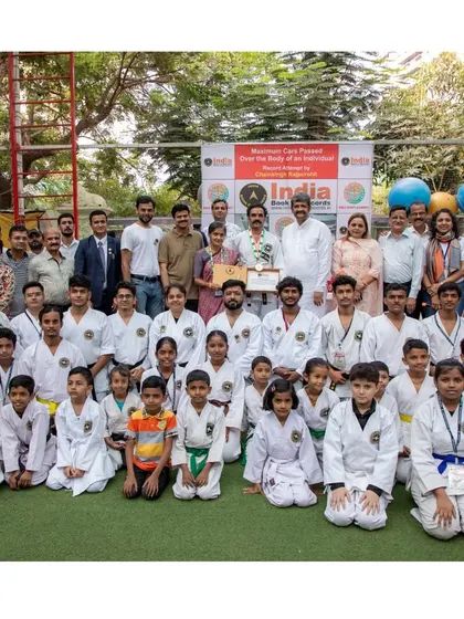 A group photograph with my students and the esteemed guests who came to witness the record. Our academy is one big family.