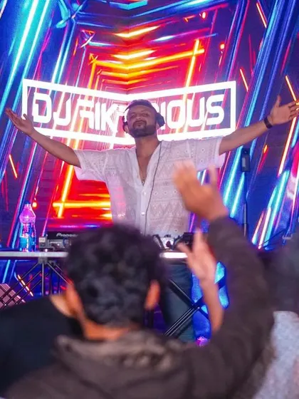 Arms wide open, embracing the energy of the crowd. This is me in my happy place.
