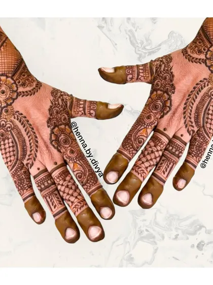 An intricate design for the back of the hands, blending different elements. I've used checks, paisleys, and florals to create a rich texture that is both modern and timeless.