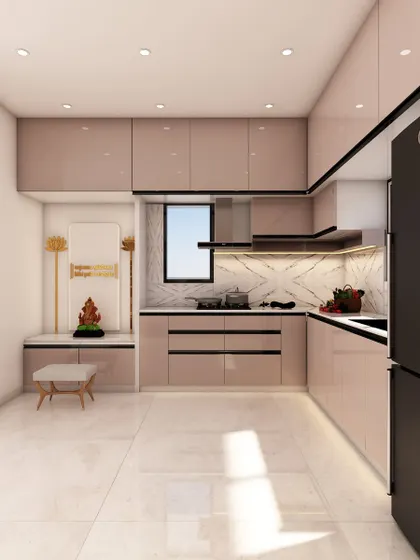 A beautiful L-shaped kitchen in a soft blush tone, with a dedicated pooja space seamlessly integrated into the design.