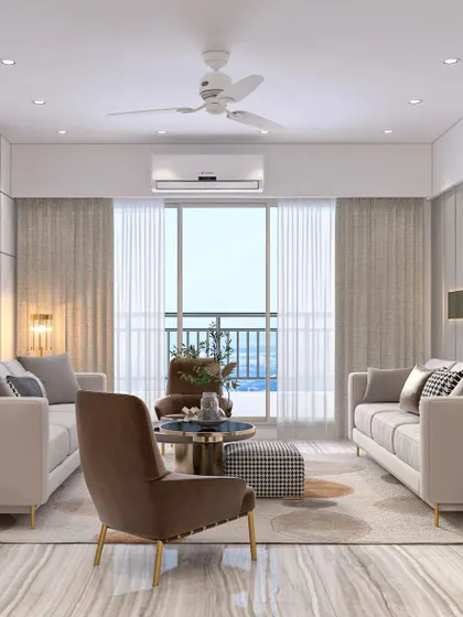 An elegant living room designed to foster conversation. The layout features two sofas facing each other, with large windows providing a beautiful view and plenty of natural light.