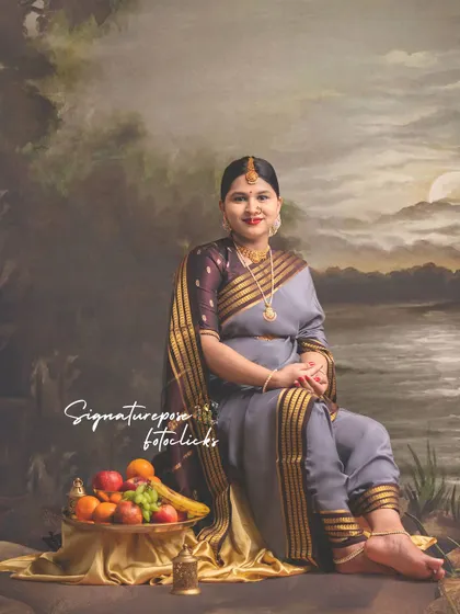 This is another take on the serene, seated portrait, capturing a slightly different angle and expression.