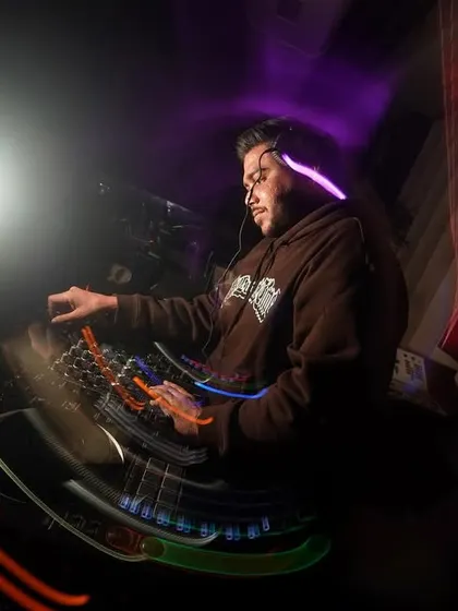 A unique wide-angle, motion-blur photo that puts you right in the middle of the action at the DJ booth.