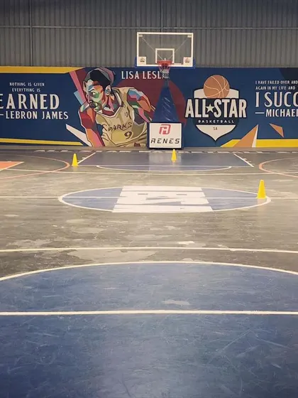 This is where the magic happens. Our full court is flanked by a mural of legends like LeBron James, Lisa Leslie, and Michael Jordan to inspire every player who steps on the floor. It’s a constant reminder of what’s possible with hard work and dedication.