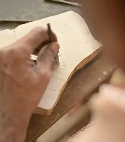 The soul of our craft is in the hands of our artisans. This video captures the intense focus and traditional techniques of our master carvers as they translate historic designs from Australia's Bábbarra Women's Centre into teak wood blocks, a true cross-cultural exchange.