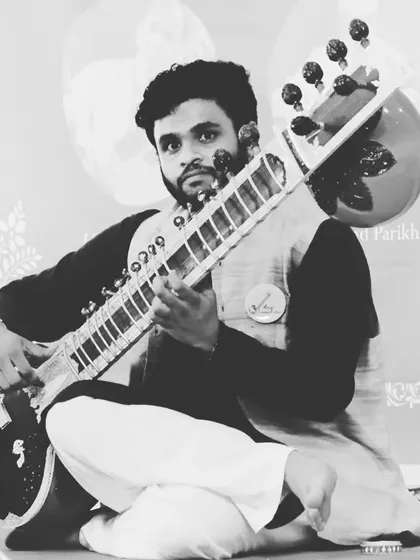 A contemplative pose with my sitar. Each performance is a tribute to my gurus and the rich lineage of this art form.