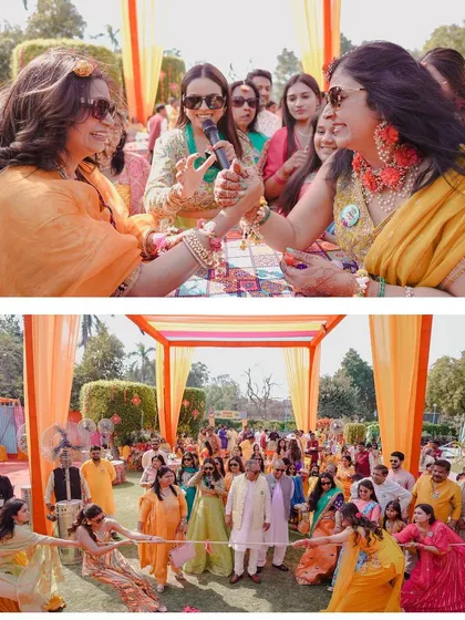 Capturing the fun and games of a Mehendi event, with family members engaged in a friendly tug-of-war. It's these moments of collective joy that make a wedding memorable.