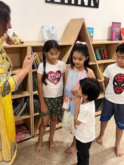 Telling the story of Lord Ganesha. I always start our festival celebrations with a story to give the children context for the activities we are about to do.
