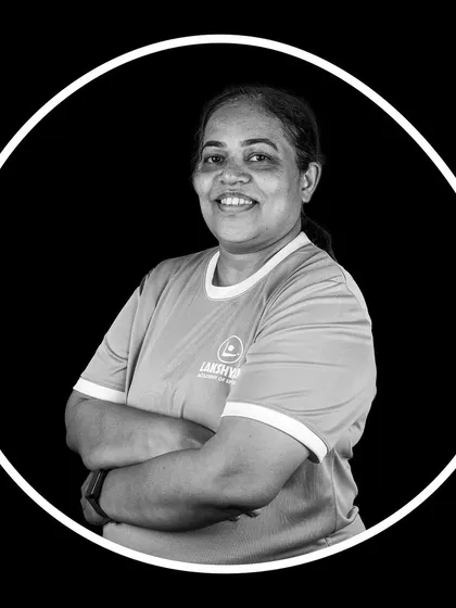 A portrait of our Lead Badminton Coach, Mrs. Manju T Abraham, a highly experienced and certified coach.