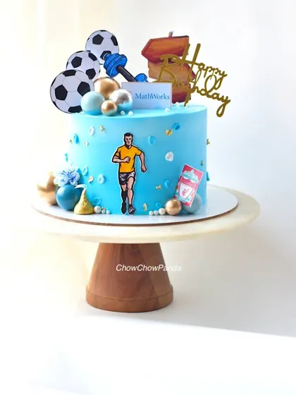 A custom cake for someone who loves running and football. This Chocolate Truffle cake features toppers representing his hobbies and workplace.