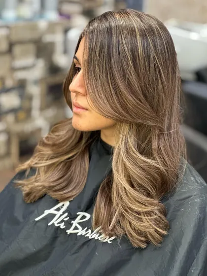 The hair looks healthy, shiny, and full of movement.