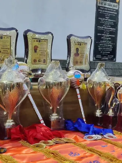A collection of trophies and awards from various championships. This display in our dojo serves as a constant motivation for all our students.