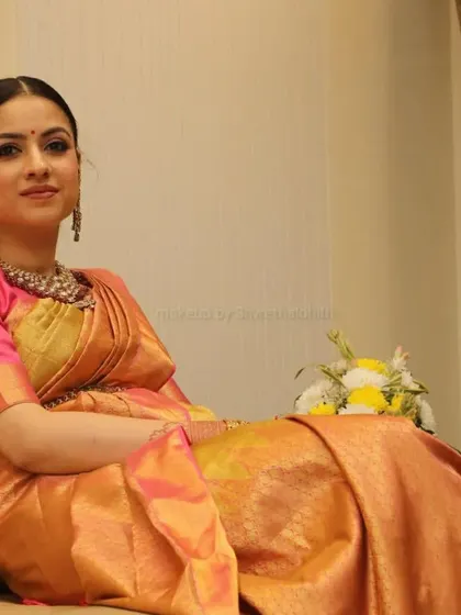 A relaxed portrait of Anuja. This soft glam makeup is perfect for those who prefer an understated yet polished look for traditional functions.