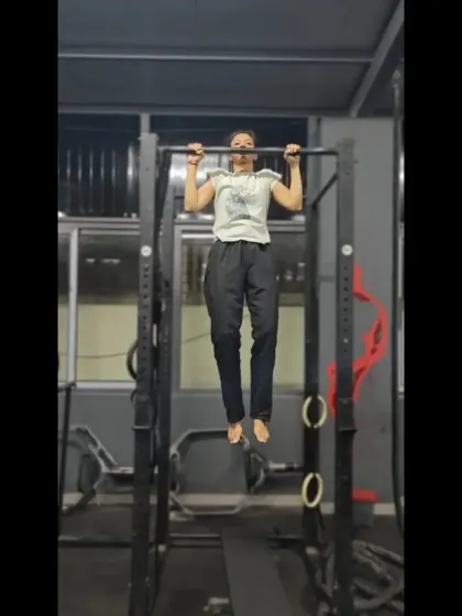 A member holding a pull-up at our new center. This simple move is a testament to the upper body strength we build, one rep at a time.