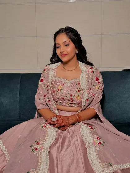 A full-length shot showing her complete Roka look. The outfit is modern yet traditional, and the hair and makeup complete the elegant style.