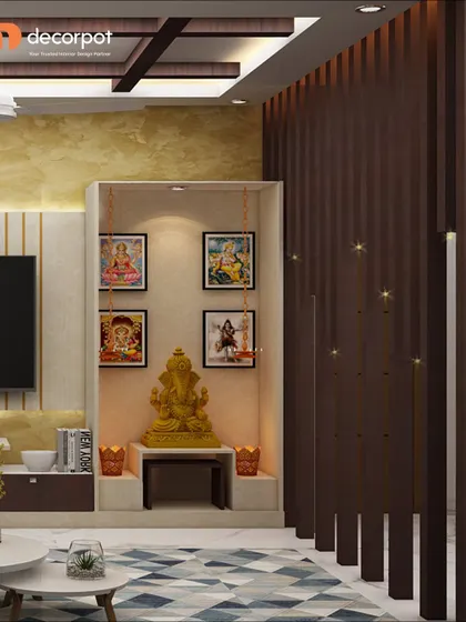 This pooja unit is cleverly integrated next to the TV area. The simple niche design with a golden Ganesha idol creates a small but powerful spiritual corner in the living room.