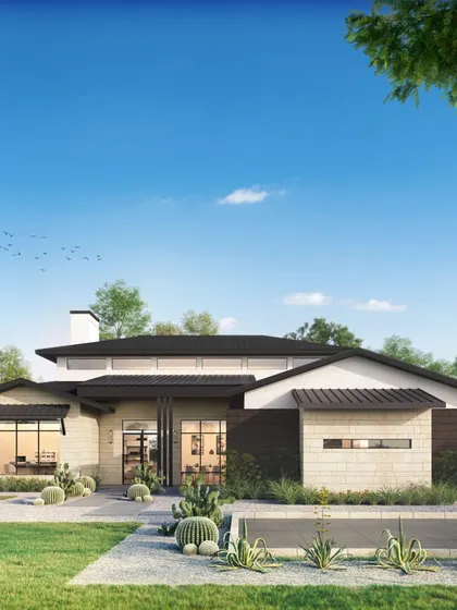 A single-story modern ranch-style home set in a grassy landscape. The rendering captures the sprawling layout and connection to the outdoors, typical of this architectural style.