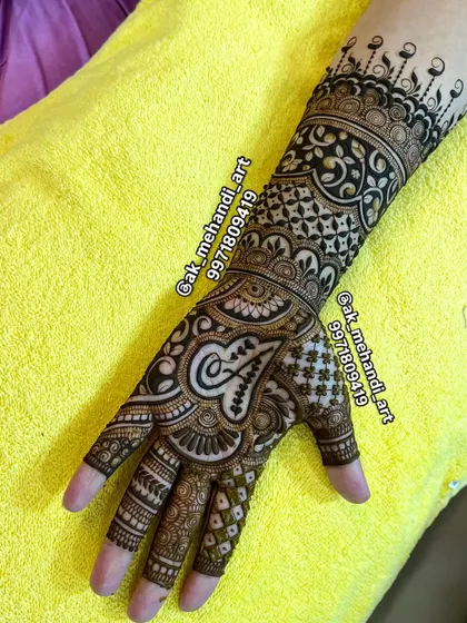 A subtle and elegant way to personalize your mehndi. I've hidden the initial 'A' within the heart of this intricate engagement design.